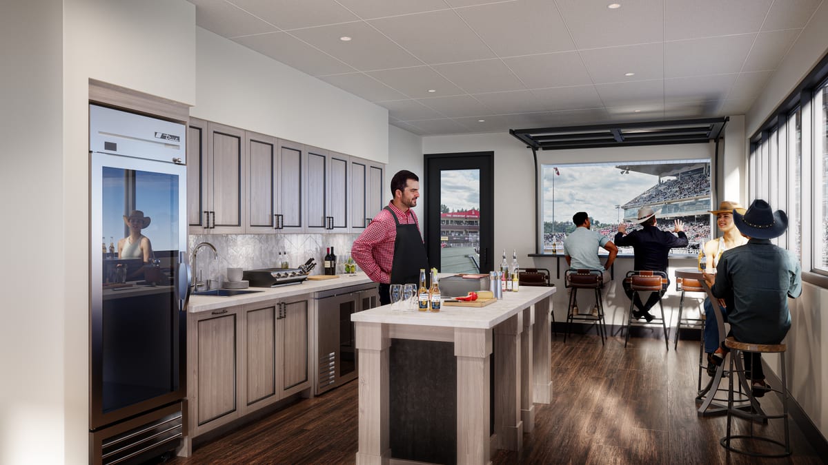 Rendering of a private hospitality suite with kitchen and bar seating overlooking the Calgary Stampede rodeo